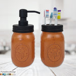 Mason Jar Soap Pump & Toothbrush Holder Set, Shown in Burnt Orange with Black Lids