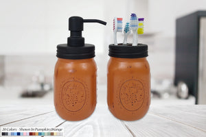 Mason Jar Soap Pump & Toothbrush Holder Set, Shown in Burnt Orange with Black Lids